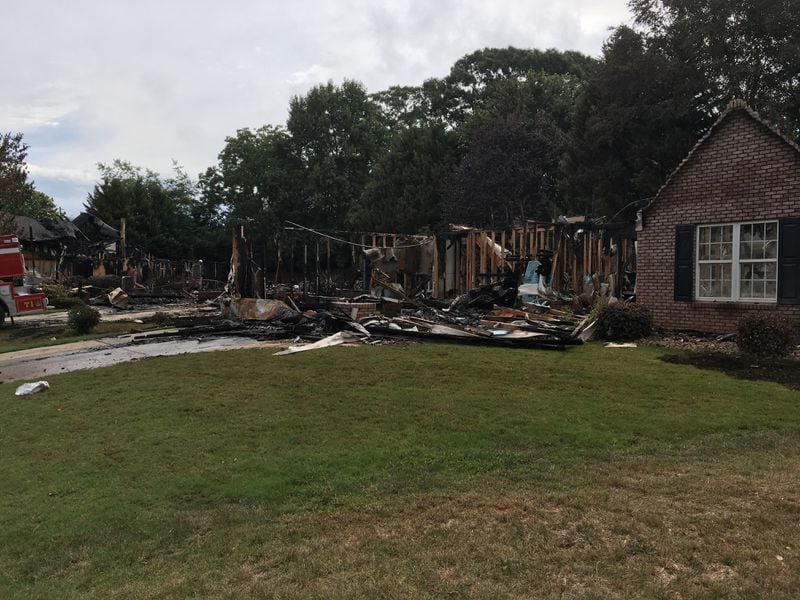 Three families were able to safely escape from the Burt's Crossing Drive homes before firefighters arrived. (Credit: Georgia Fire Marshal's Office)