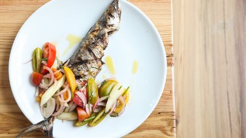 Grilled mackeral with tomato, cucumber, red onion and herbs. (styling by Chef Angus Brown ) (Photography by Renee Brock/Special)