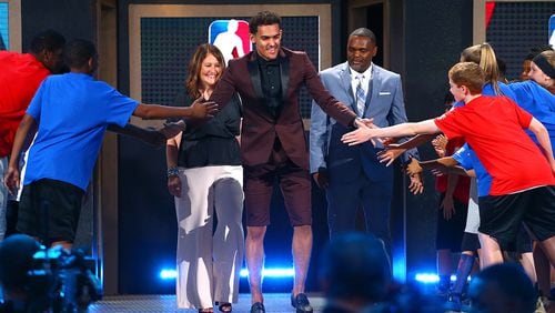 NEW YORK, NY - JUNE 21:  Trae Young is introduced before the 2018 NBA Draft at the Barclays Center on June 21, 2018 in the Brooklyn borough of New York City. NOTE TO USER: User expressly acknowledges and agrees that, by downloading and or using this photograph, User is consenting to the terms and conditions of the Getty Images License Agreement.  (Photo by Mike Stobe/Getty Images)