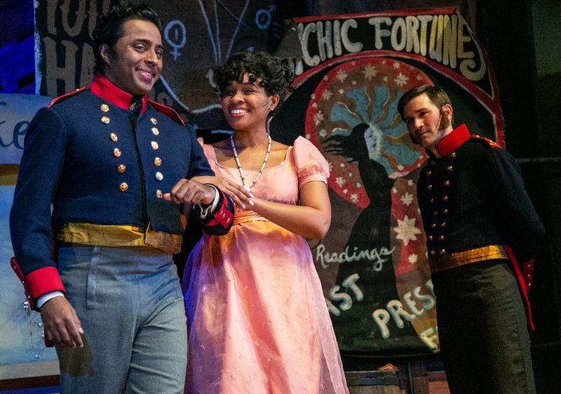 Georgia Ensemble Theatre’s “Vanity Fair,” featuring Tamil Periasamy (from left), Tatyana Arrington and Eric Lang, continues through March 6.
Courtesy of Casey Ford