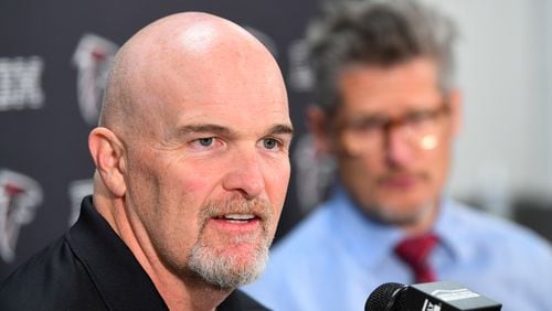Falcons head coach Dan Quinn believes college football players should be a part of the conversation when it comes to issues affecting them on the field.