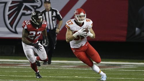 December 4, 2016 Atlanta - Kansas City Chiefs running back Spencer Ware (32) gets tackled by Atlanta Falcons defensive end Tyson Jackson (left) and Atlanta Falcons strong safety Keanu Neal (22) during the second half in an NFL football game at the Georgia Dome on Sunday, December 4, 2016. Kansas City Chiefs won 29 - 28 over the Atlanta Falcons. HYOSUB SHIN / HSHIN@AJC.COM