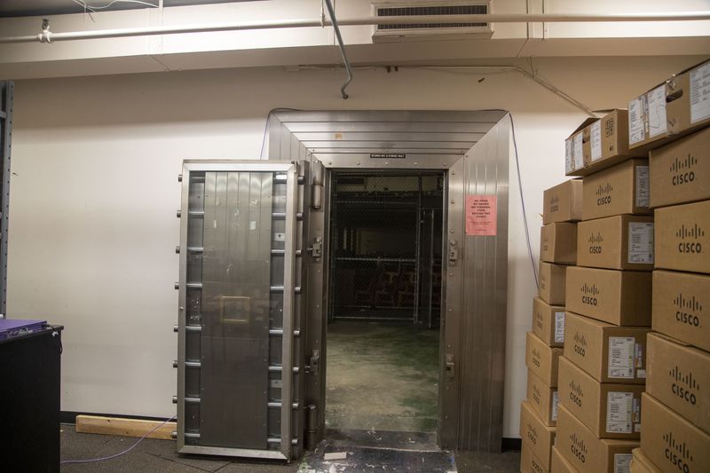 A vault door to a former Trust Company records management and storage room still stands as the entrance to what will be the new Georgia State University photographic archive room, located inside the T Parking Deck at the Georgia State University main Atlanta campus. (Alyssa Pointer/Atlanta Journal Constitution)
