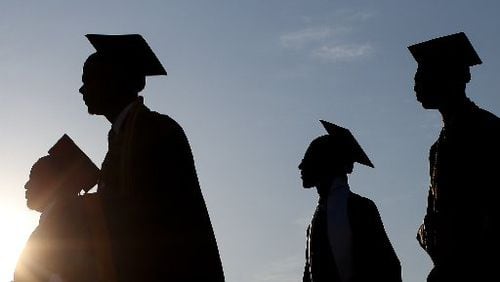 The percentage of DeKalb County School District students who graduated fell slightly between 2015 and 2016. (AJC FILE PHOTO)