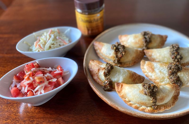 Besties makes about 30 different kind of empanadas, which many fans love with chimichurri sauce. To go with the savory pastries, there’s creamy cole slaw and tomato salad with onions and oregano.
Wendell Brock for The Atlanta Journal-Constitution