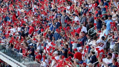 Atlanta Braves fans performed the tomahawk chop as the Braves faced off against the St. Louis Cardinals in Game 1 of the National League Playoffs at SunTrust Park in Cobb County on October 3, 2019. (JASON GETZ / SPECIAL TO THE AJC)