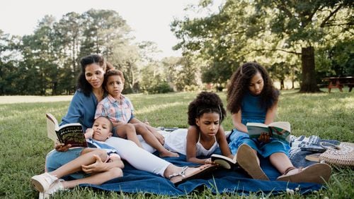 Amber O’Neal Johnston of Cobb County home-schools her four children and shares her observations on education, living books, and home schooling at HeritageMom.com, and connects with followers on Instagram (@heritagemomblog). (Courtesy of Nicole Eliason)