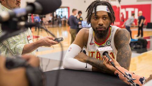 Atlanta Hawks forward DeAndre' Bembry speaks with members of the press during the Atlanta Hawks Media day at the Emory Sports Medicine Complex, Monday, September 24, 2018. (ALYSSA POINTER/ALYSSA.POINTER@AJC.COM)