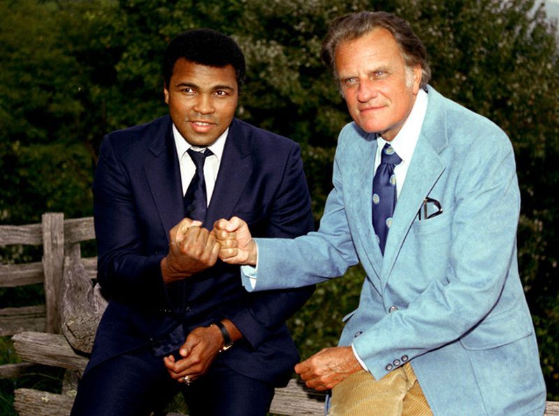 Muhammad Ali visiting with the Rev. Billy Graham in a vintage photo. Photo: billygraham.org