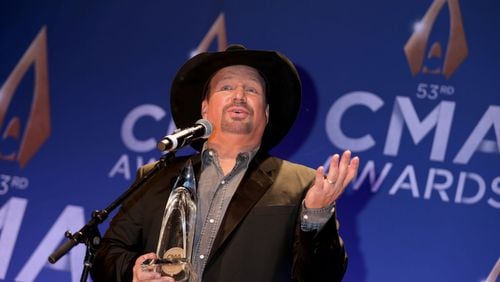 Garth Brooks poses with the CMA Award for Entertainer of the Year at the press room of the 53rd annual CMA Awards at the Bridgestone Arena on November 13, 2019 in Nashville, Tennessee. (Photo by Leah Puttkammer/Getty Images)