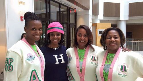 Jennifer C. Thomas (in pink and green hat), with some of her Howard University Alpha Chapter sorority sisters. Thomas, a professor at Howard, pledged AKA in 1987.