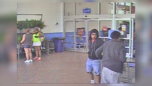 East Point police are looking for two men accused of setting three fires in a Wal-Mart. (Credit: East Point Police Department)