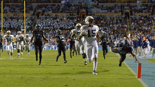 CHAPEL HILL, NC - OCTOBER 18: DeAndre Smelter #15 of the Georgia Tech Yellow Jackets scores a touchdown against the North Carolina Tar Heels during their game at Kenan Stadium on October 18, 2014 in Chapel Hill, North Carolina. North Carolina won 48-43. (Photo by Grant Halverson/Getty Images) Former Georgia Tech wide receiver DeAndre Smelter averaged 20.4 yards per catch for the Yellow Jackets last season. (GETTY IMAGES)