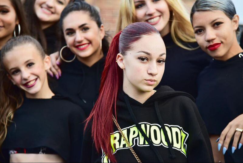 Bhad Bhabie (2nd R) poses with festivalgoers backstage during Day 2 of the Billboard Hot 100 Festival 2018 at Northwell Health at Jones Beach Theater on August 19, 2018 in Wantagh, New York.