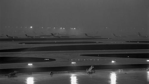 Photographer Mark Steinmetz’s “Untitled” gelatin silver print of planes on the runway at Hartsfield-Jackson International Airport. CONTRIBUTED BY THE ARTIST AND JACKSON FINE ART