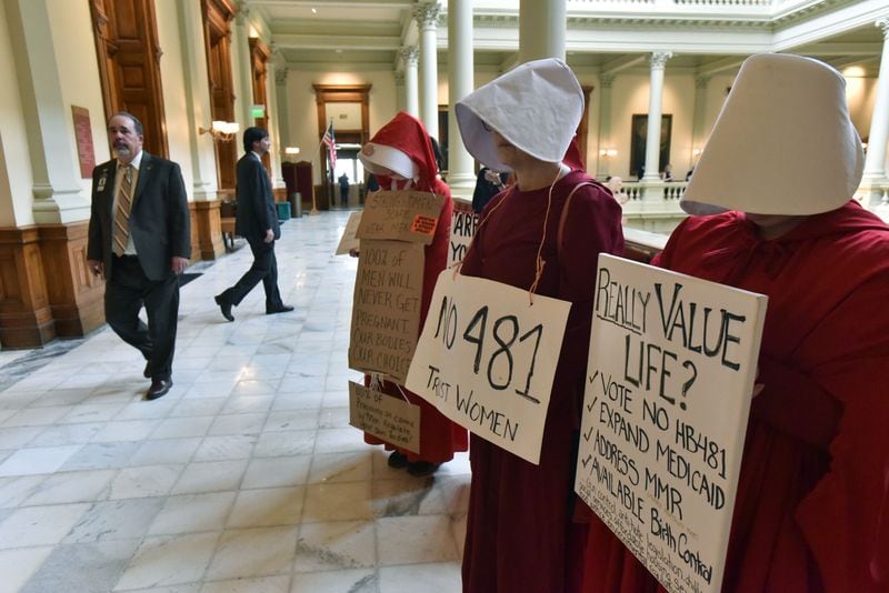March 29, 2019 Atlanta - Pro-Choice demonstrators stand in the hallway during the 38th day of legislation in the House Chambers at the Georgia State Capitol on Friday, March 29, 2019. The Georgia House narrowly voted 92-78 to approve legislation that would outlaw most abortions once a doctor can detect a heartbeat in the womb. HYOSUB SHIN / HSHIN@AJC.COM
