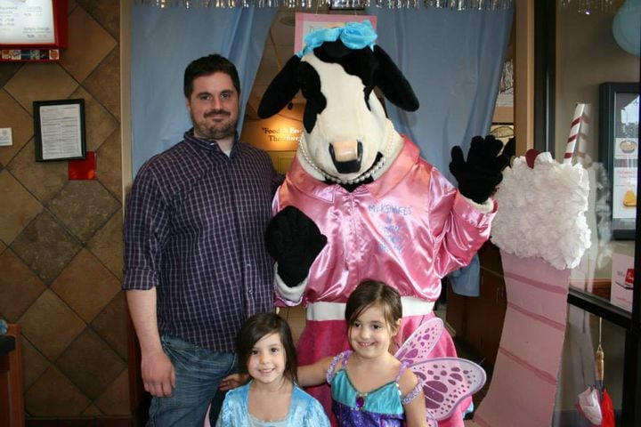 Michael Valdez and his daughters