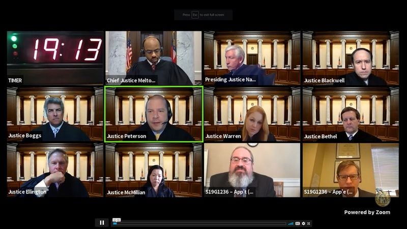 The Georgia Supreme Court hears arguments via video conference in the case of Glenn v. The State. Top row (from left): Former Chief Justice Harold Melton, Chief Justice David Nahmias and former Justice Keith Blackwell. Middle row (from left): Justices Michael Boggs, Nels Peterson, Sarah Warren and Charles Bethel. Bottom row (from left): Justices John Ellington and Carla McMillian; public defender Ben Pearlman and then-acting District Attorney Brian Patterson.