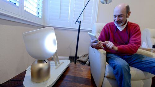 Barry Sardis interacts with ElliQ on Friday, Jan. 26, 2018 in his home in San Jose, Calif. ElliQ, which is currently in beta testing, is a smart speaker that is designed to cater to the elderly and their needs. (Dan Honda/Bay Area News Group/TNS)