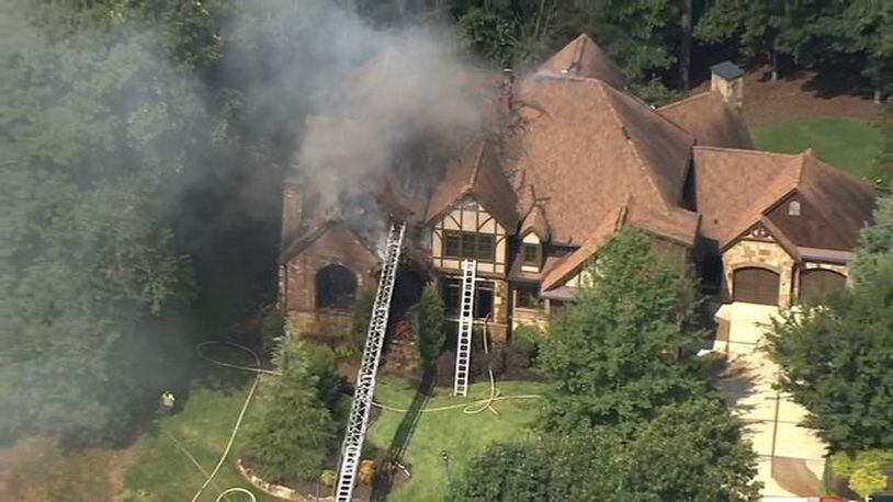 Crews battling large house fire in Gwinnett County.