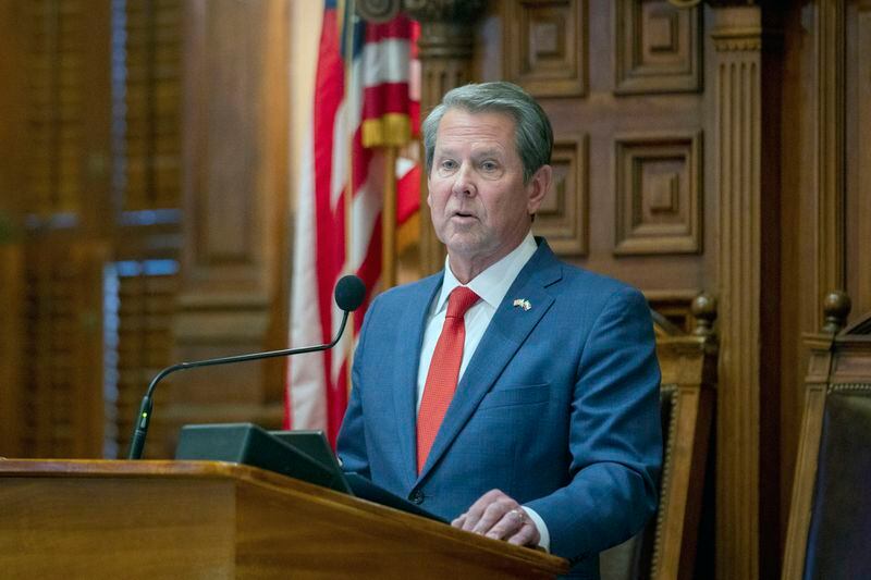 FILE -- Georgia Gov. Brian Kemp addresses the state House of Representatives at the Capitol in Atlanta on Thursday, March 28, 2024. Kemp on Tuesday, May 7, 2024, vetoed a bill that would have suspended tax breaks for new and expanding data centers. (Arvin Temkar/Atlanta Journal-Constitution via AP, file)
