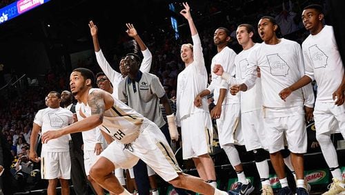 The Georgia Tech bench watches as Tadric Jackson watches his three-point attempt drop into the basket during Sunday's ACC home win over Syracuse.