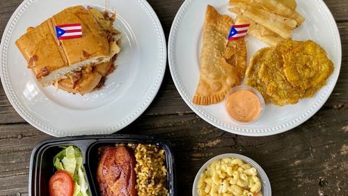 A takeout order from My Abuelas Food includes La Tripleta de Mr. Pig sandwich; an appetizer sampler with a beef empanadilla, tostones and fried yuca; and Valeria’s Birthday Plate (fried pork chop, rice and peas and pasta salad).
Wendell Brock for The Atlanta Journal-Constitution