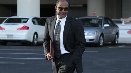 January 25, 2017, Atlanta, Georgia - Defendant Elvin “E.R.” Mitchell Jr. returns to his car after his hearing in Atlanta, Georgia, on Wednesday, January 25, 2017. (HENRY TAYLOR / HENRY.TAYLOR@AJC.COM)