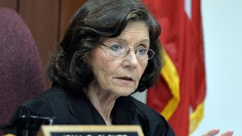 Judge Irma Glover speaks to the audience during a criminal arraignment at Cobb County State Court in Marietta in 2013. Her retirement was announced on Tuesday. Hyosub Shin, hshin@ajc.com