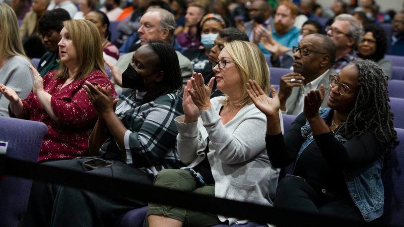 Attendees clap during a panel discussion about concerns with safety and violence in Gwinnett County and its schools Nov. 2, 2022, at New Mercies Christian Church in Lilburn. A second event in Lawrenceville will include public input and discussion by students, parents and teachers along with community leaders. (Christina Matacotta for The Atlanta Journal-Constitution)