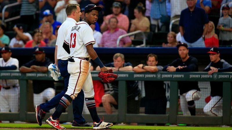Ronald Acuna Jr. of the Braves exits the game during the second inning against the Miami Marlins at SunTrust Park on August 15, 2018. (Photo by Daniel Shirey/Getty Images)