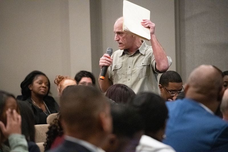 Doug Jenkins speaks out during a town hall meeting about his experiences at the Cobb County Detention Center after saying that he was released from jail the previous night. PHOTO BY ELISSA BENZIE