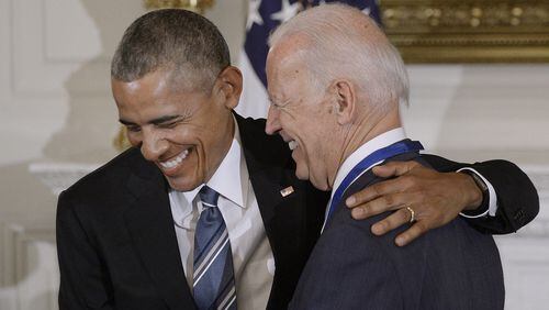 WASHINGTON, DC - JANUARY 12: President Barack Obama (R) presents the Medal of Freedom to Vice-President Joe Biden during an event in the State Dinning room of the White House, January 12, 2017 in Washington, DC. (Photo by Olivier Douliery-Pool/Getty Images)