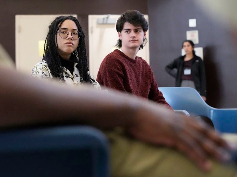 DePaul students Seven Clark, left, and Max Rocchio listens to Sister Helen Prejean during a book club at Department Of Corrections Division 11 in Chicago, Monday, April 22, 2024. DePaul students and detainees are currently reading Dead Man Walking and the author, anti death penalty advocate, Sister Helen Prejean attended to lead a discussion. (AP Photo/Nam Y. Huh)