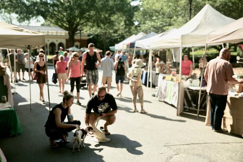 Spring and summer days bring people and their pets to the Saturday morning Green Market at Piedmont Park. CONTRIBUTED BY GREEN MARKET AT PIEDMONT PARK