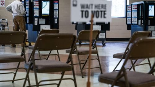 A voter casts a primary ballot on March 12 in Atlanta. (Elijah Nouvelage/AFP/Getty Images/TNS)