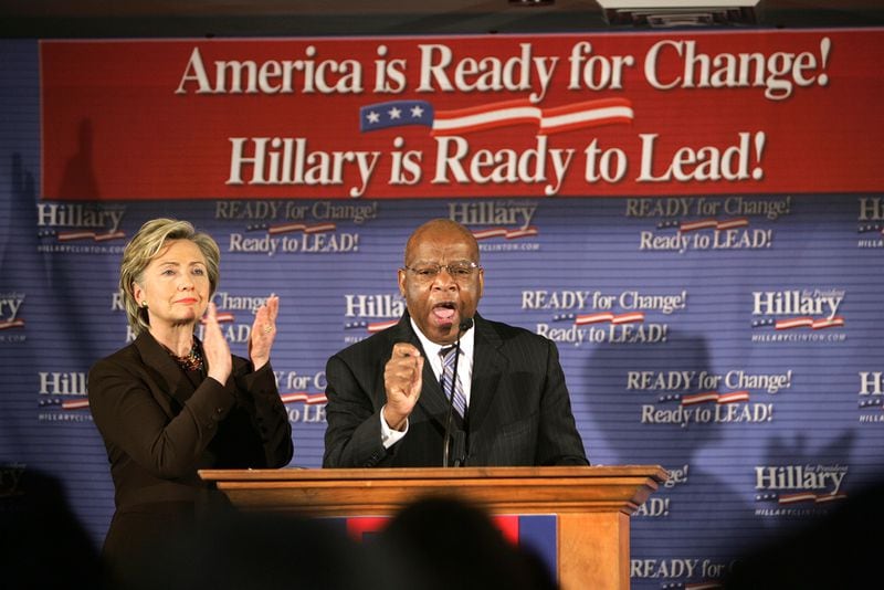 During the 2008 Democratic presidential primary, John Lewis campaigned for his friend Sen. Hillary Clinton (seen here at an Atlanta rally in late 2007). But after months of soul-searching, Lewis switched his endorsement to Sen. Barack Obama. Lewis explained that despite his loyalty to friends, Obama's campaign struck him as "a movement" and "a spiritual event" that he hadn't seen coming. "Sometimes, you have to be on the right side of history," he said. Lewis backed Clinton in 2016 in her primary fight with Sen. Bernie Sanders. (JOHN SPINK / AJC)