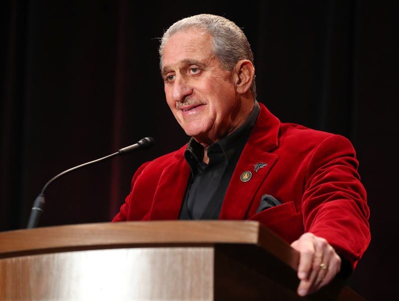  February 3, 2017, Houston: Atlanta Falcons owner Arthur Blank, wearing a team color bright red jacket, chuckles while asked a question about his dancing while holding his only media availability in Houston for the Super Bowl during a press conference at the George R. Brown Convention Center on Friday Feb. 3, 2017, in Houston. Blank has danced in the locker room and on stage with his players on their march to the Super Bowl. Curtis Compton/ccompton@ajc.com