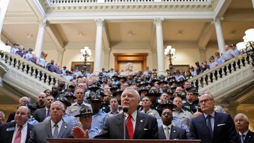 In this September 2016 photo, Gov. Nathan Deal proposes Thursday a 20 percent pay hike for state law enforcement officers and an overhaul of police training. Bob Andres, bandres@ajc.com
