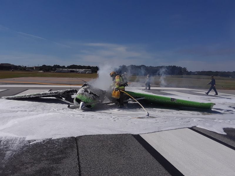 Crews put out the fire that engulfed a small plane at the Gwinnett County Airport.