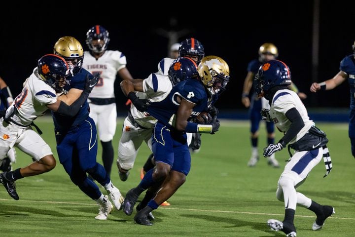 St. Pius’ Jack Tchienchou (22) carries the ball during a GHSA High School football game between St. Pius and Mundy’s Mill at St. Pius Catholic School in Atlanta, GA, on Friday, November 11, 2022.(Photo/Jenn Finch)