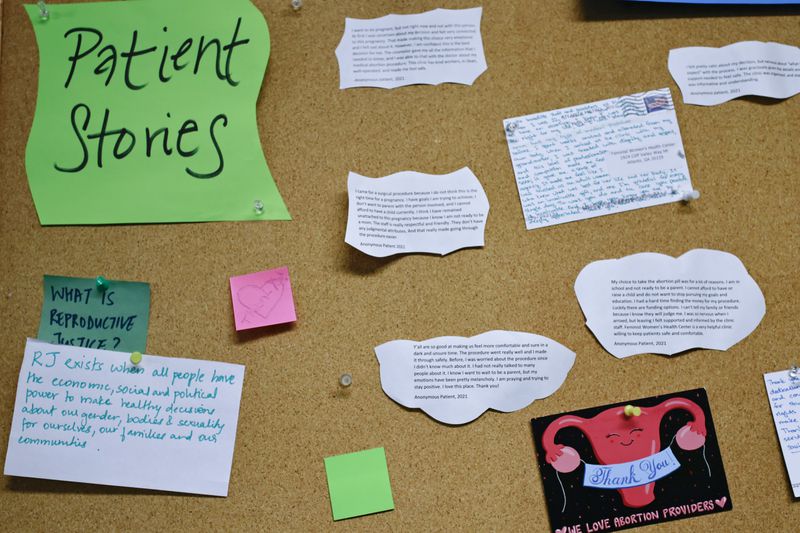A collection of anonymous notes from abortion patients hang on a bulletin board at Feminist Women’s Health Center in Brookhaven on Wednesday, August 17, 2022. (Natrice Miller/natrice.miller@ajc.com)