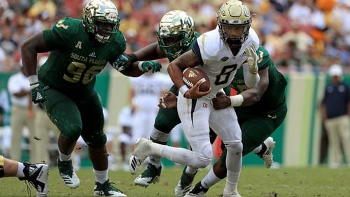 TAMPA, FL - SEPTEMBER 08:  Tobias Oliver #8 of the Georgia Tech Yellow Jackets rushes during a game against the South Florida Bulls at Raymond James Stadium on September 8, 2018 in Tampa, Florida.  (Photo by Mike Ehrmann/Getty Images)