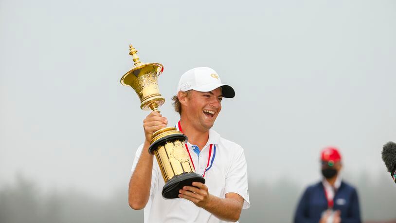 For the second straight year it's a Georgia Tech golfer raising the U.S. Amateur trophy in victory - this time, it's Ty Strafaci (Steven Gibbons/USGA)