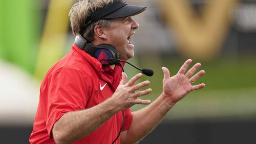Georgia head coach Kirby Smart yells at his players from the sideline in the second half of an NCAA college football game against Vanderbilt, Saturday, Oct. 14, 2023, in Nashville, Tenn. (AP Photo/George Walker IV)