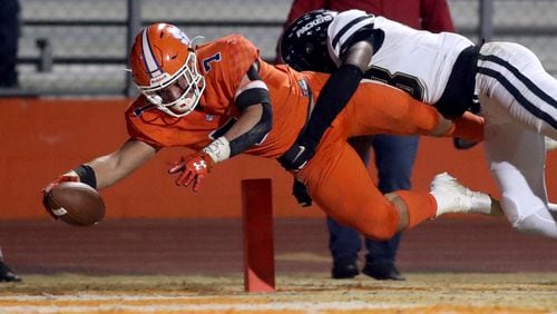 Parkview running back Cody Brown (7) dives for a touchdown in the fourth quarter of a game against Colquitt County last season. (Jason Getz/Special)
