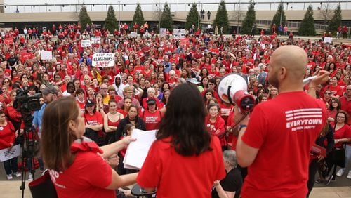 Without a power source for their PA system, speakers at the Moms Demand Action Advocacy Day rally last week at Liberty Plaza struggled until they acquired a bullhorn. PHOTO / JASON GETZ