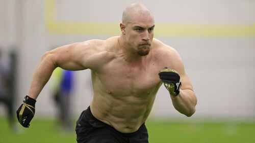 Lindenwood University linebacker Connor Harris works out in Westfield, Ind. Tuesday, Feb. 21, 2017. (AP Photo/Michael Conroy)