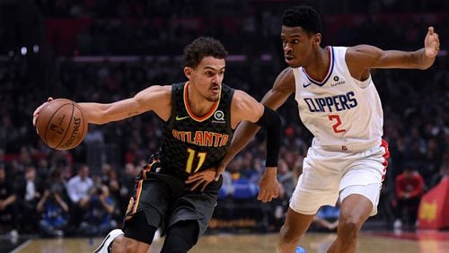 Trae Young of the Atlanta Hawks drives on Shai Gilgeous-Alexander of the LA Clippers during a 123-118 Hawks win at Staples Center on January 28, 2019 in Los Angeles, California. (Photo by Harry How/Getty Images)