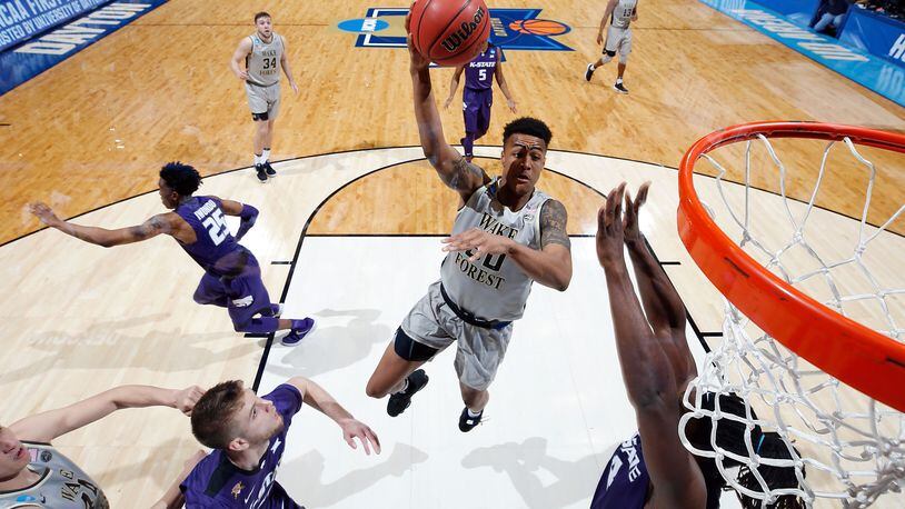 John Collins of the Wake Forest Demon Deacons drives to the basket against the Kansas State Wildcats in the second half during the First Four game in the 2017 NCAA Men’s Basketball Tournament at UD Arena on March 14, 2017 in Dayton, Ohio. (Photo by Joe Robbins/Getty Images)
